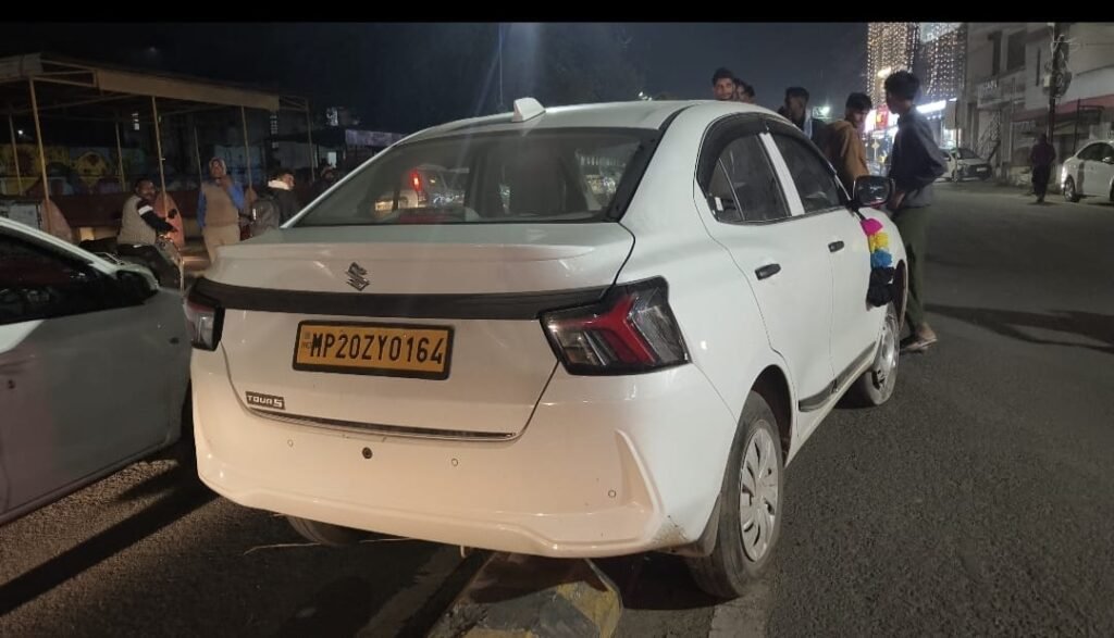 Car hits divider, narrowly averts major accident; bright lights the culprit!